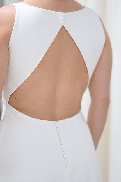 V-NECK DRESS WITH TRIANGULAR OPEN BACK